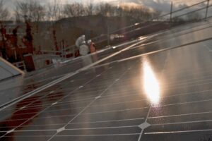 Sunlight on a rooftop solar panel