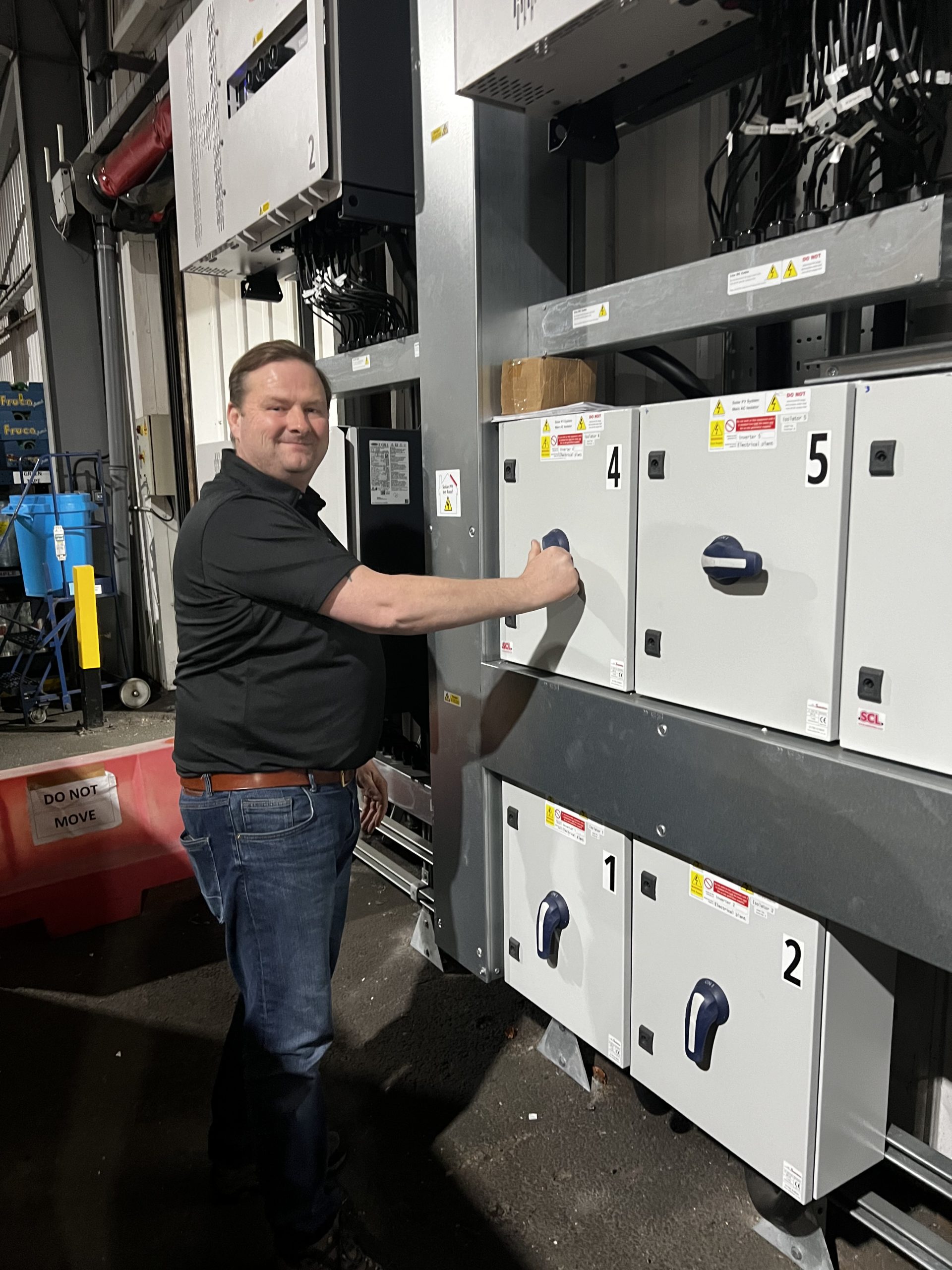 Richard Hall - Operations Director at Eco-Pak switches on the new solar arrays.